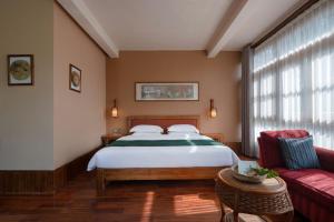 Postel nebo postele na pokoji v ubytování Moondance Boutique Resort