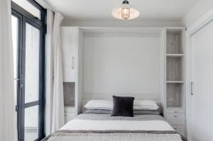 Cama ou camas em um quarto em Luxury Mt Eden Apartment