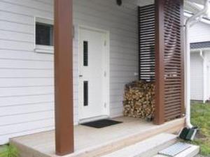 una porta d'ingresso di una casa con portico di Holiday Home 4 seasons a 1 by Interhome a Lahdenperä