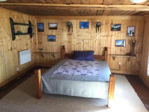 Кровать или кровати в номере Domik Gnezdyshko