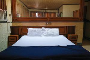 Postel nebo postele na pokoji v ubytování Hotel Happy Home