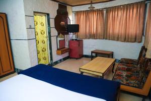 Kuchyň nebo kuchyňský kout v ubytování Hotel Happy Home