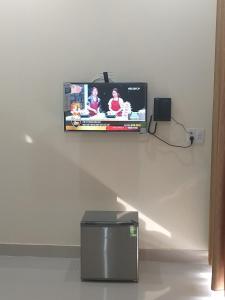 TV a/nebo společenská místnost v ubytování RIVERBANK MOTEL
