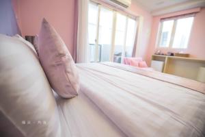 Voodi või voodid majutusasutuse Slow corner homestay toas