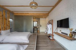 Letto o letti in una camera di Autumn Inn