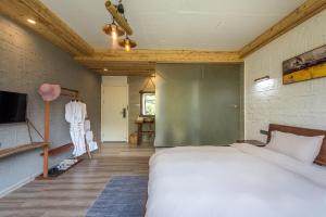 Letto o letti in una camera di Autumn Inn