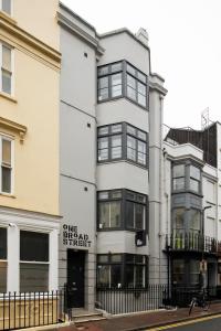 a large building with a large window on the side of it at One Broad Street in Brighton & Hove