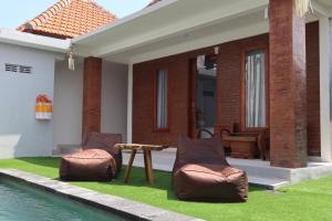 Bazén v ubytování Gangga Guest House nebo v jeho okolí