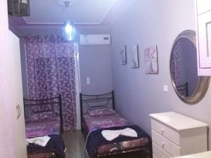 Posteľ alebo postele v izbe v ubytovaní Villa Marili