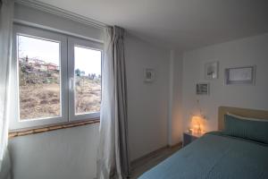 Posteľ alebo postele v izbe v ubytovaní Villa Mamma Mia Oprtalj