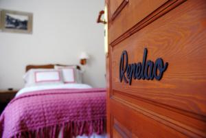 
Een bed of bedden in een kamer bij Casa Rural Priena
