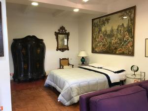 Postel nebo postele na pokoji v ubytování alloggio turistico La Stalla