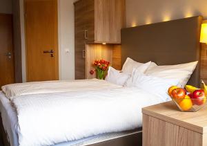 Postel nebo postele na pokoji v ubytování Hotel Morjan