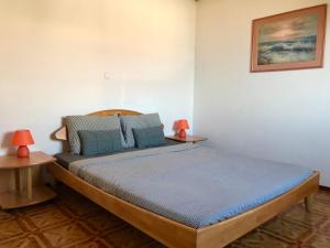 Postel nebo postele na pokoji v ubytování Apartmani Lisac