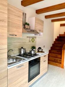 Kuchyňa alebo kuchynka v ubytovaní Sweet Home