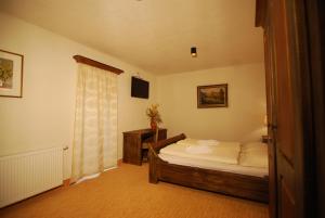 Ein Bett oder Betten in einem Zimmer der Unterkunft Hotel 3 Gemsen