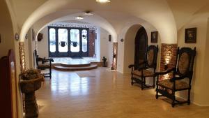Ein Sitzbereich in der Unterkunft Hotel 3 Gemsen