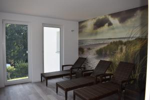Ein Sitzbereich in der Unterkunft Sellinkoje in Residenz Waldidyll