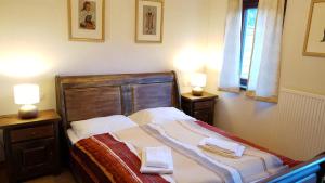 Ein Bett oder Betten in einem Zimmer der Unterkunft Hotel 3 Gemsen