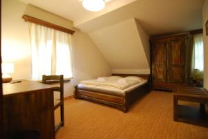 Ein Bett oder Betten in einem Zimmer der Unterkunft Hotel 3 Gemsen