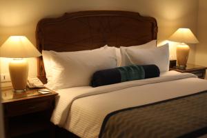 Cama o camas de una habitación en The Lalit Traveller- Airport hotel