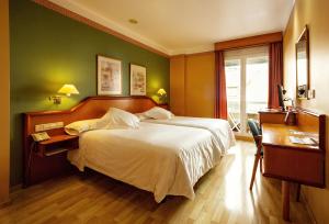 Posteľ alebo postele v izbe v ubytovaní Hotel Torrepalma