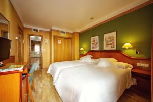 Posteľ alebo postele v izbe v ubytovaní Hotel Torrepalma