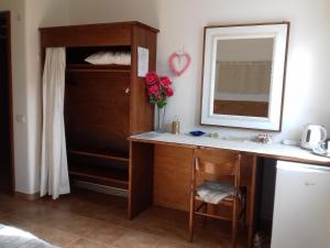 A bed or beds in a room at Canne Al Vento