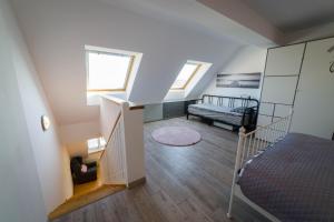 Posteľ alebo postele v izbe v ubytovaní Apartament51