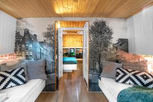 a bedroom with a mural of a city at Asile Flottant in Amsterdam