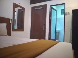 Indah Nusantara 객실 침대