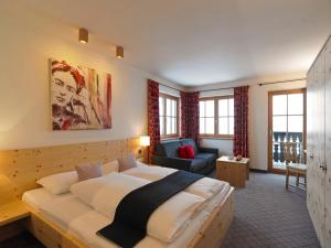 Ліжко або ліжка в номері Hotel Garni Frommes