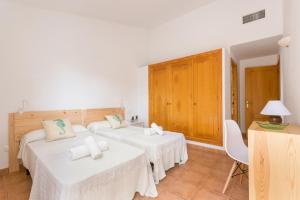 Postel nebo postele na pokoji v ubytování Villa Aries