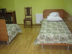 Postel nebo postele na pokoji v ubytování Hotel Nova