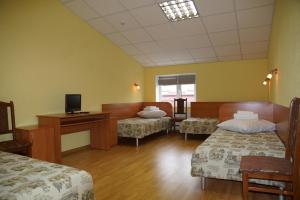 Postel nebo postele na pokoji v ubytování Hotel Nova