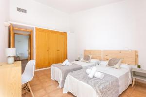 Postel nebo postele na pokoji v ubytování Villa Aries