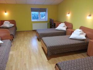Postel nebo postele na pokoji v ubytování Hotel Nova