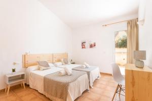 Postel nebo postele na pokoji v ubytování Villa Aries
