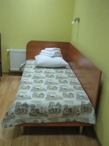 Postel nebo postele na pokoji v ubytování Hotel Nova