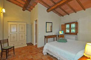 Postel nebo postele na pokoji v ubytování Le Ginestre B & B