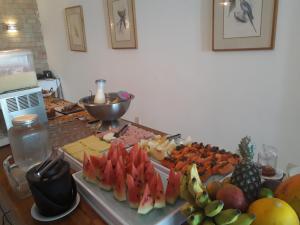 a table topped with lots of different types of food at Villa da Praia Hotel in Salvador