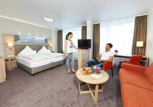 Postel nebo postele na pokoji v ubytování Hotel Morjan