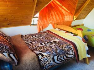 Postel nebo postele na pokoji v ubytování El Chalet del Lago