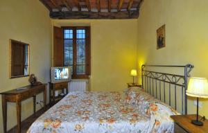 Postel nebo postele na pokoji v ubytování Le Ginestre B & B