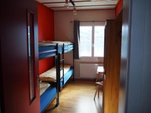 Postel nebo postele na pokoji v ubytování Hostel Rotschuo Jugend- und Familienferien