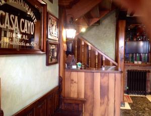 El salón o zona de bar de Casa Cayo