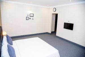 Rúm í herbergi á Ha Trinh Hotel