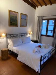 Ένα ή περισσότερα κρεβάτια σε δωμάτιο στο Domus Plaza