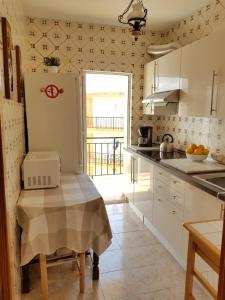 Kuchyňa alebo kuchynka v ubytovaní Les Bovetes Apartment + 18 fotografií