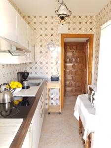 Kuchyňa alebo kuchynka v ubytovaní Les Bovetes Apartment